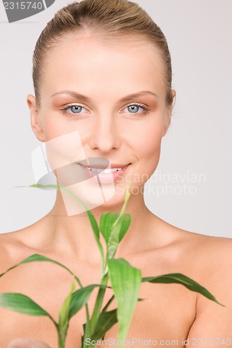 Image of woman with sprout