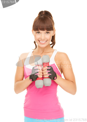 Image of fitness instructor with dumbbells