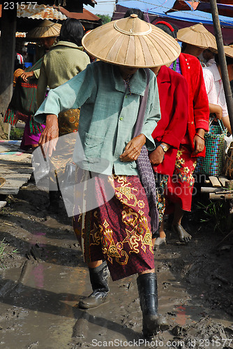 Image of Woman in mud