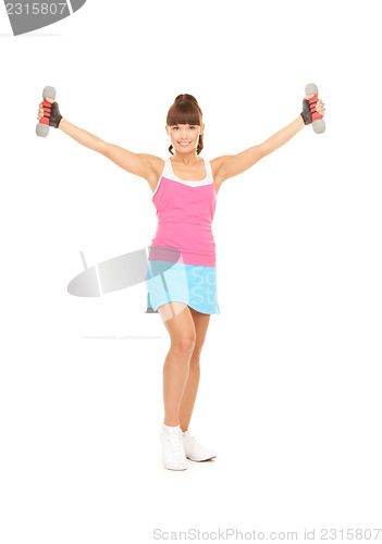 Image of fitness instructor with dumbbells