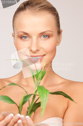 Image of woman with sprout