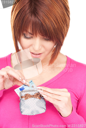 Image of lovely woman with purse and money