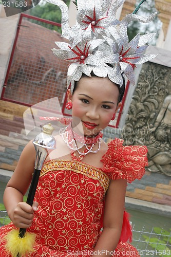 Image of Thai girl in traditional dress during in a parade, Phuket, Thail