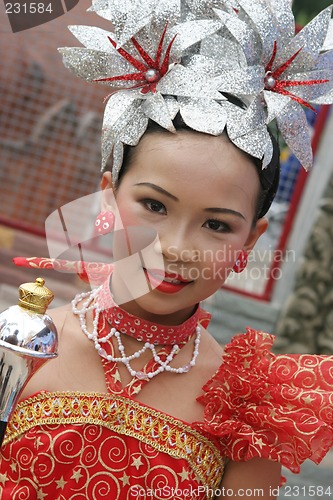 Image of Thai girl in traditional dress during in a parade, Phuket, Thail