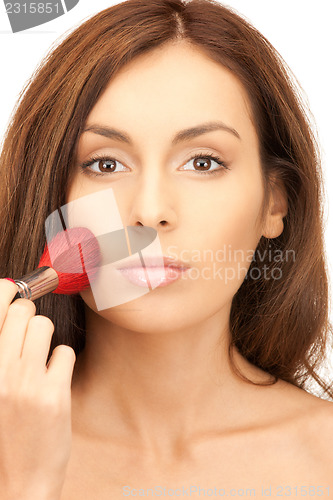 Image of lovely woman with brush