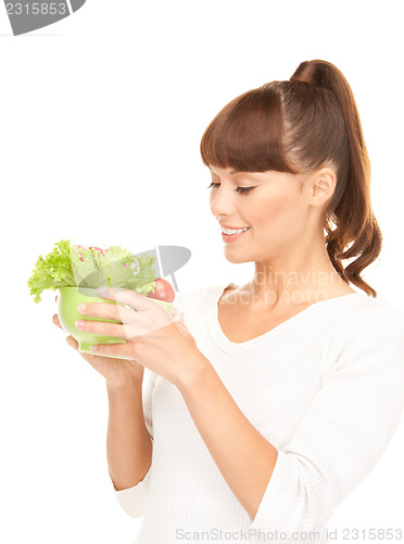 Image of beautiful housewife with vegetables