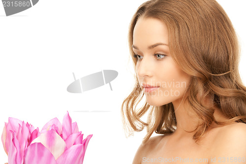Image of beautiful woman with lotus flower 