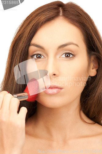 Image of lovely woman with brush