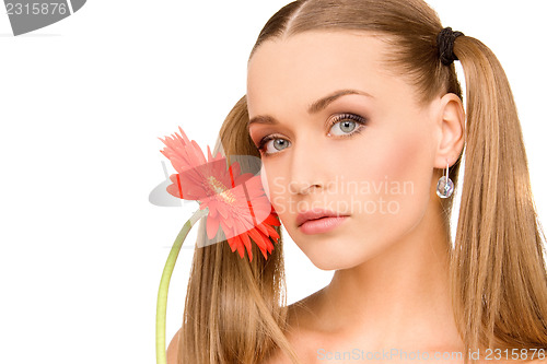 Image of woman with red flower