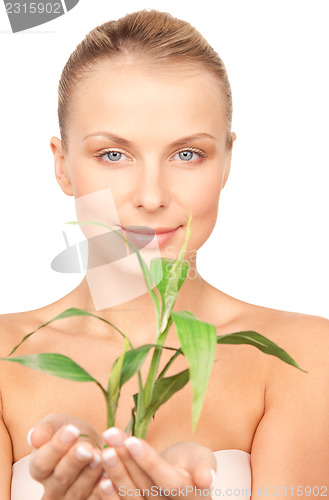 Image of woman with sprout