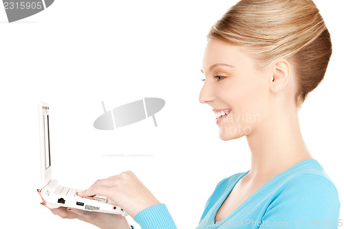 Image of happy woman with laptop computer