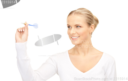 Image of businesswoman throwing a dart