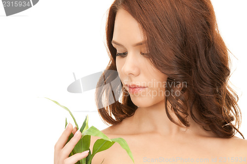 Image of woman with sprout