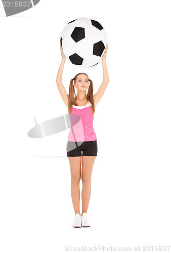 Image of lovely woman with big soccer ball