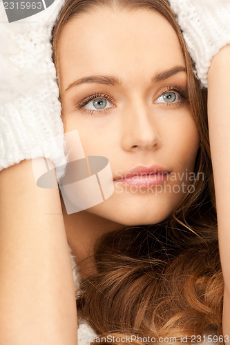 Image of beautiful woman in white gloves