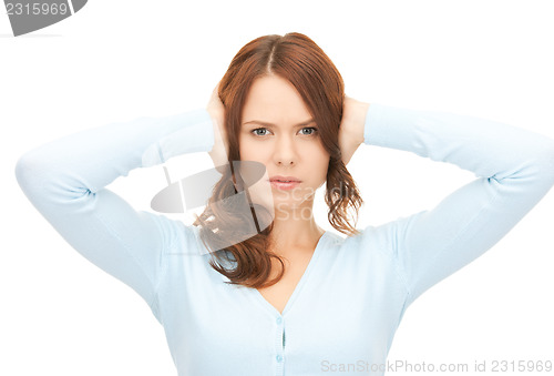 Image of woman with hands on ears