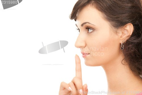 Image of finger on lips 