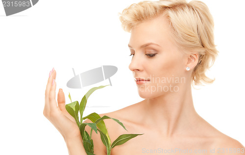 Image of woman with sprout