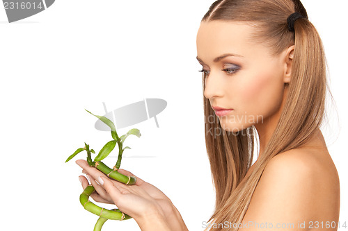 Image of woman with sprout
