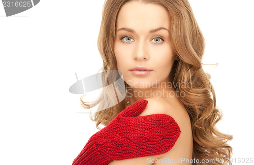 Image of beautiful woman in red mittens 