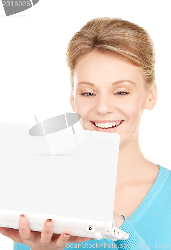 Image of happy woman with laptop computer