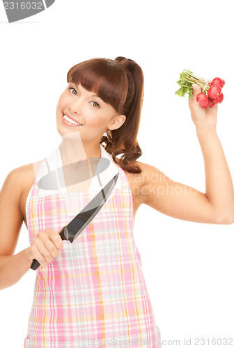 Image of housewife with big knife and radish