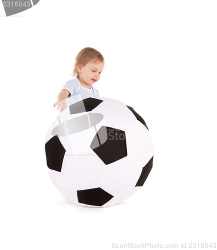 Image of baby boy with soccer ball