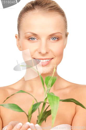 Image of woman with sprout
