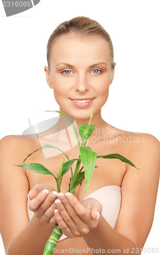Image of woman with sprout
