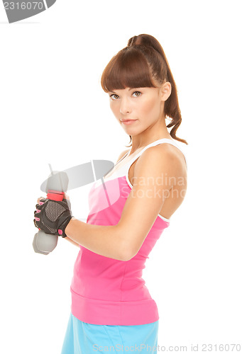 Image of fitness instructor with dumbbells