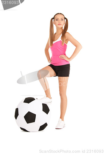 Image of lovely woman with big soccer ball