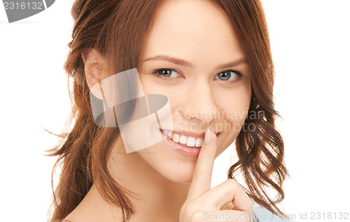 Image of finger on lips
