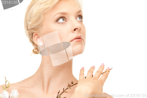 Image of lovely woman with twig