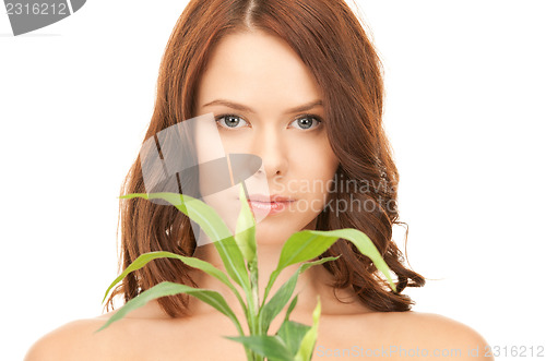 Image of woman with sprout