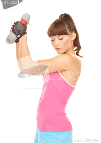 Image of fitness instructor with dumbbells