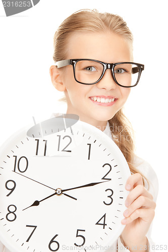 Image of girl holding big clock