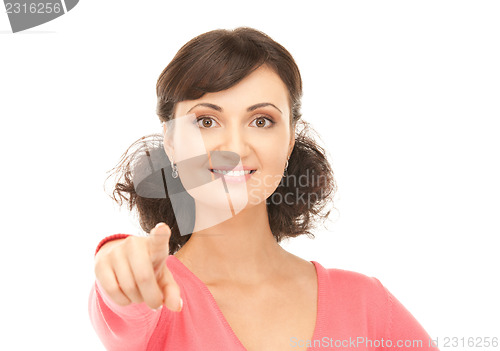 Image of attractive businesswoman pointing her finger