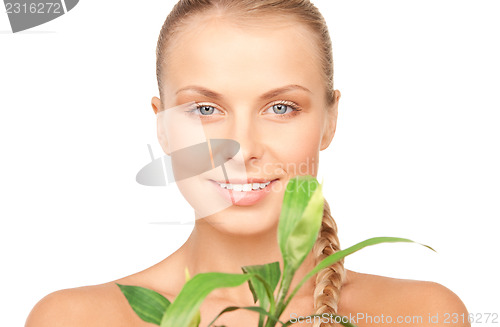 Image of woman with sprout