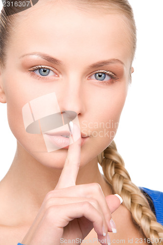 Image of finger on lips