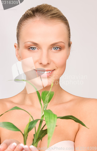 Image of woman with sprout