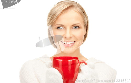 Image of beautiful woman with red mug