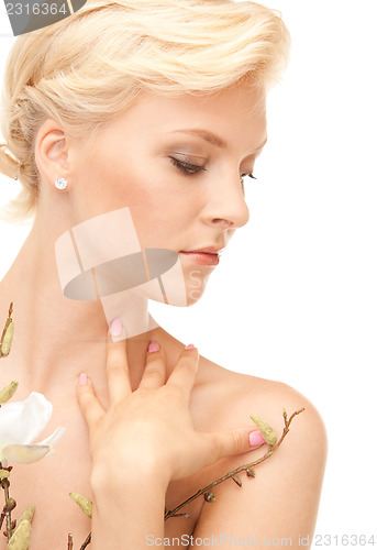 Image of lovely woman with twig