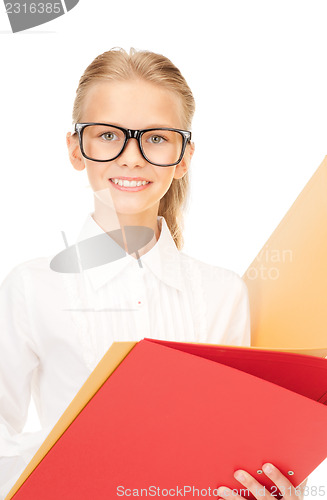 Image of elementary school student with folders