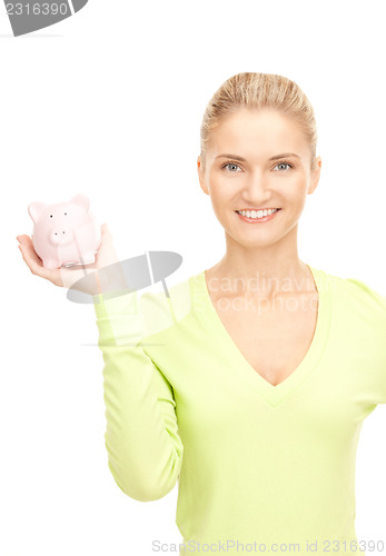Image of woman with piggy bank