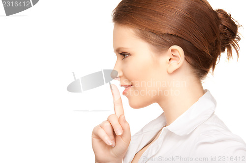 Image of finger on lips