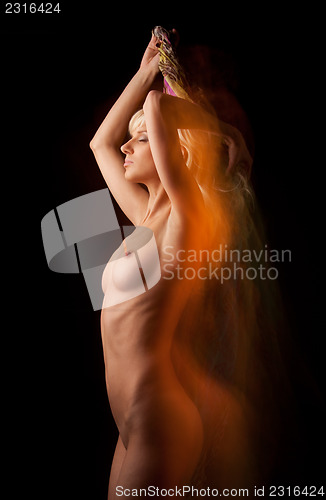 Image of long exposure mixed light picture of naked woman