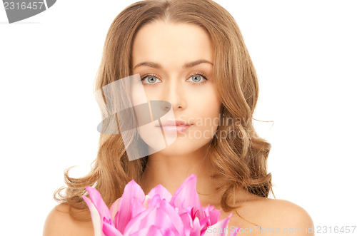 Image of beautiful woman with lotus flower 