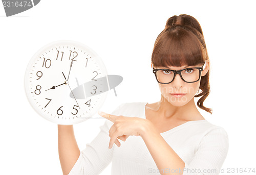 Image of woman holding big clock