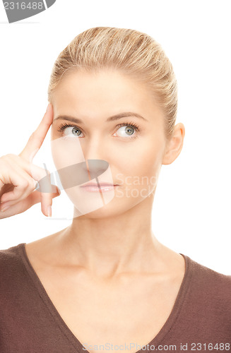 Image of pensive businesswoman over white