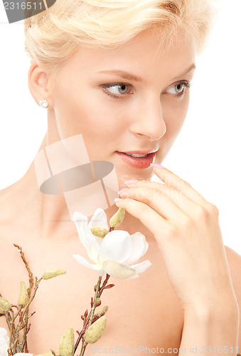 Image of lovely woman with twig